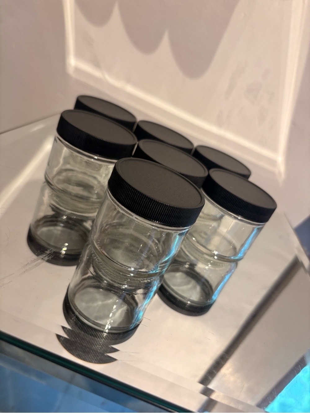 Small glass storage jars